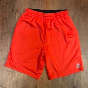 Orange gym shorts